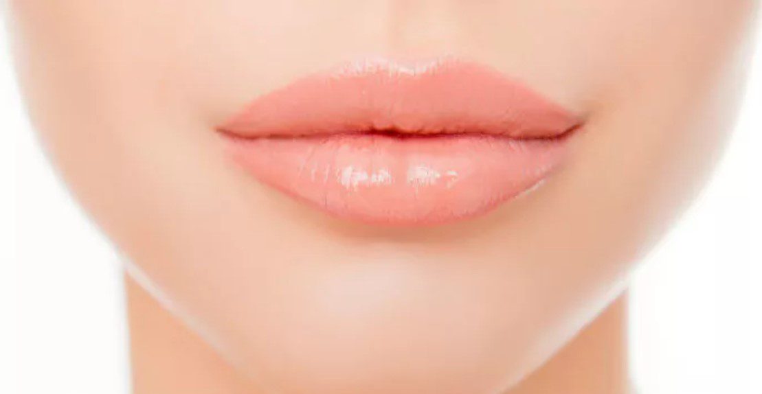 A close up of the lips and chin of a woman